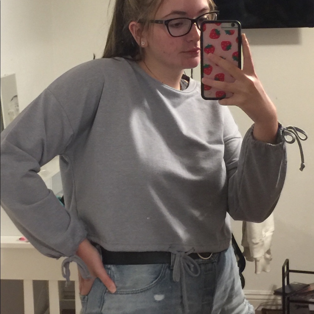 Gray sweater.
